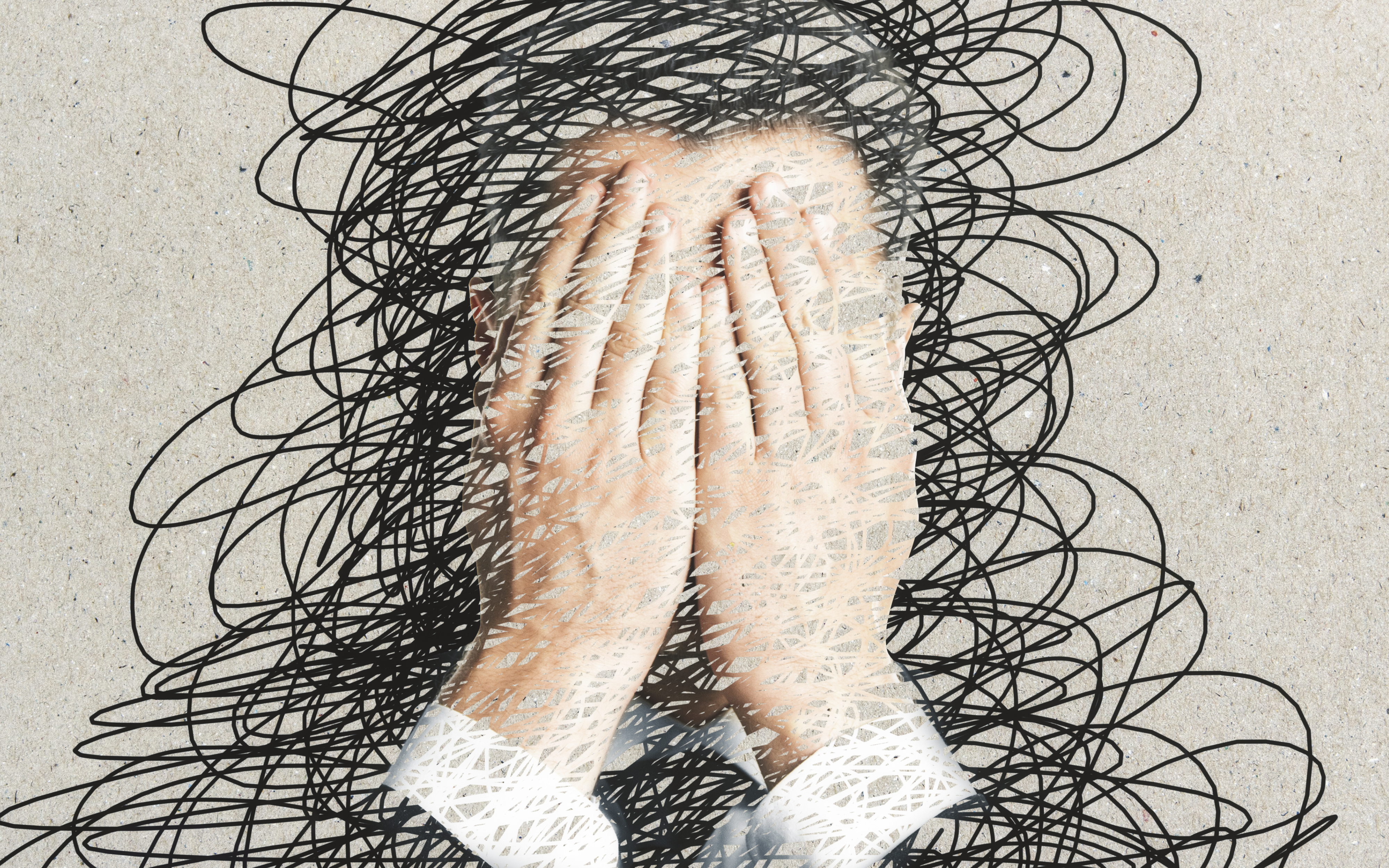 Person covering their face surrounded by illustration of black pen scribbles